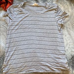 Black, white, and grey striped shirt.